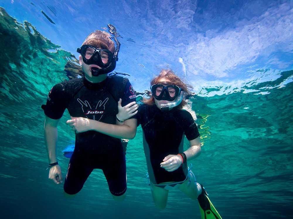 snorkeling is a must for the kids on a family holiday to Indonesia