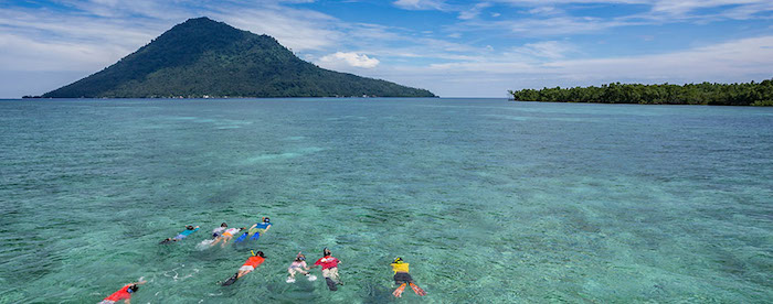 Family snorkeling in Bunaken